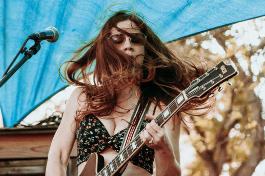 Djunah performs at Caterwaul 2024 with singer Donna Diane playing guitar and screaming
