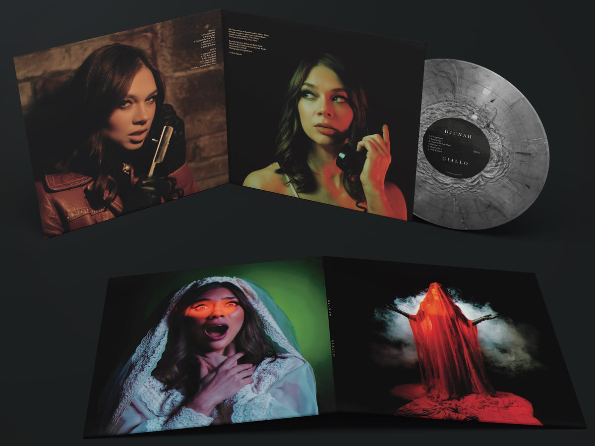 A vinyl record album shown open with multiple printed sleeves and inserts on a dark background. The record itself is a pale smoky gray, and the artwork features a woman in a white robe with dramatic red and green lighting, plus a dark portrait on one sleeve.