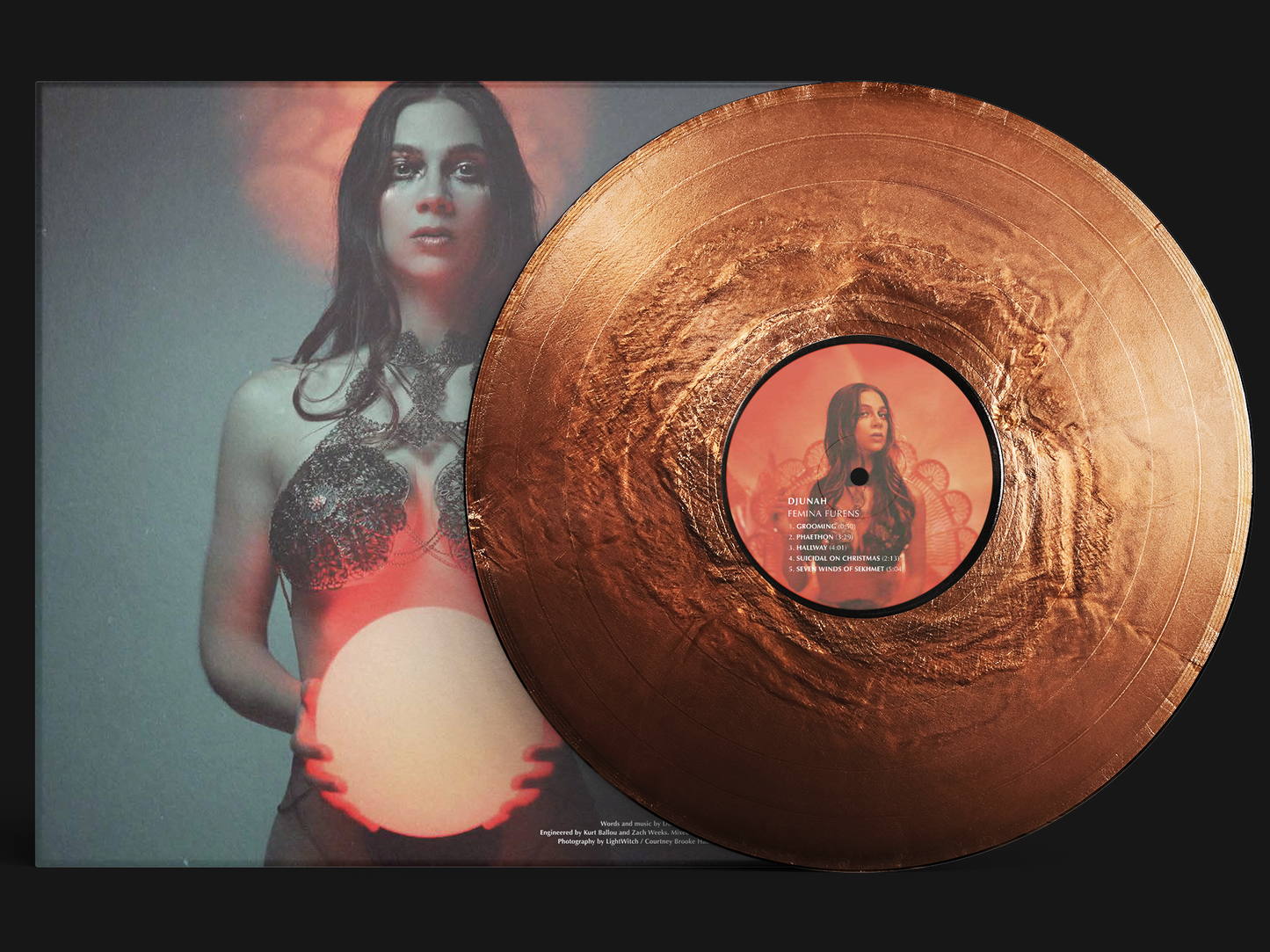 Djunah "Femina Furens" second pressing 12" LP on molten copper vinyl, reverse cover, pressed by Smashed Plastic in Chicago, Illinois